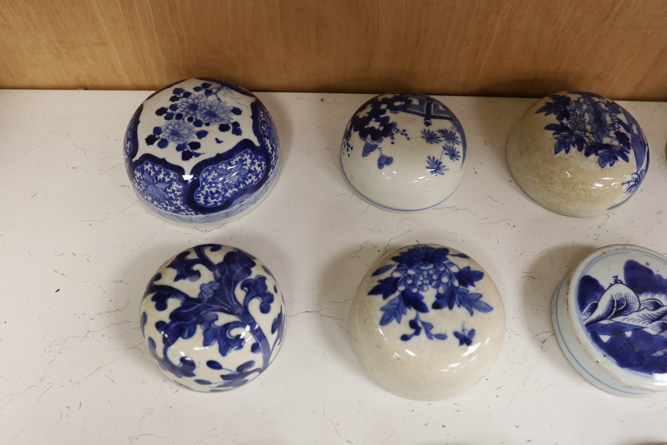 Fifteen 18th/19th century Chinese blue and white jar covers, largest 13.3cm diameter, Provenance - D.C.Monk & Son, former dealers based in Kensington Church Street, London W8